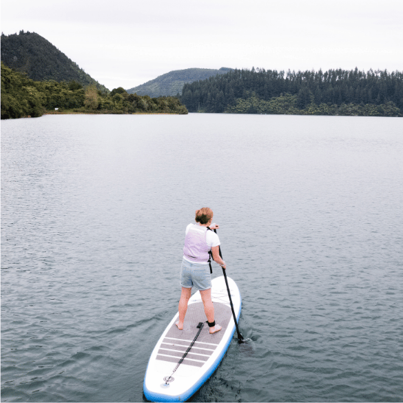 Jumping off rocks into the ocean